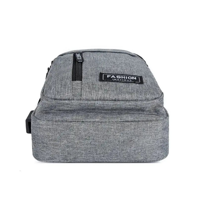 Multifunctional chest bag in grey Oxford cloth with front zip pocket; compact men's crossbody bag.