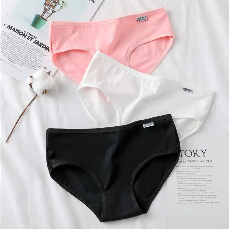 Women's cotton panties 3-pack by Simples Market in pink, white, and black; soft breathable briefs