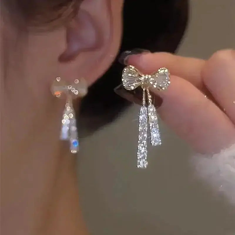 Punk geometric zinc alloy bow earrings with crystal tassel drops for women