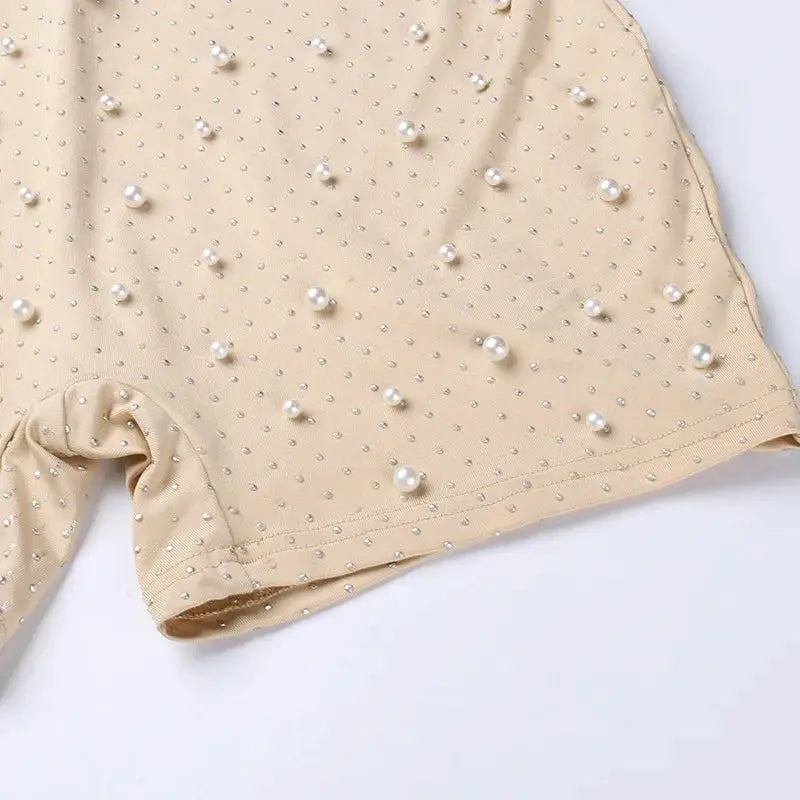 Simples Market apricot beaded jumpsuit, O-neck sleeveless romper with pearl embellishments