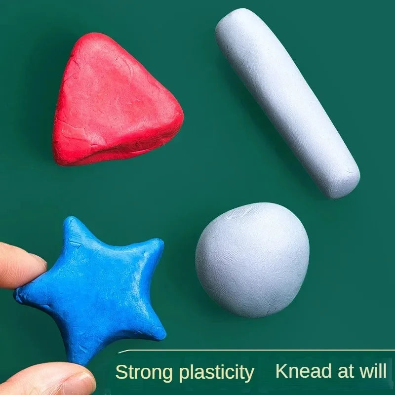 Kneaded erasers set featuring red triangular, blue star, gray ball and light-gray cylinder on green background
