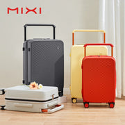 Mixi four-piece hardside travel luggage set with wide handles and spinner wheels in gray, yellow, and red