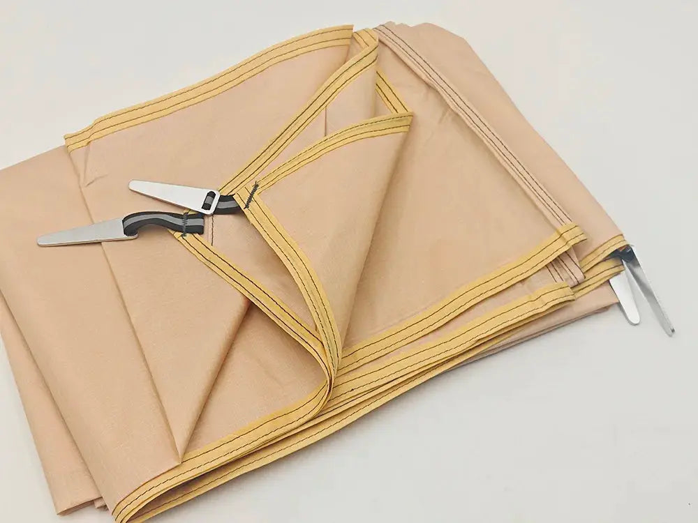 Waterproof camping mat from Simples Market, large tan foldable tent mat with yellow trim and pegs