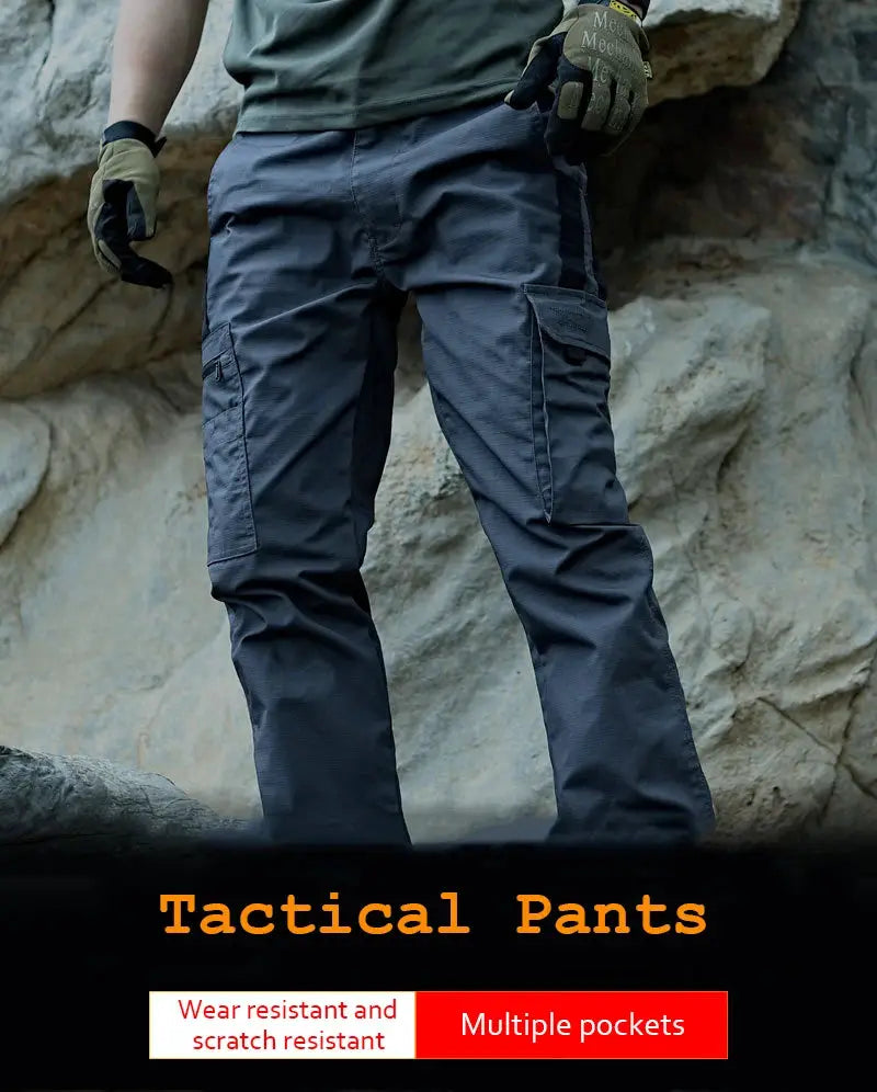 Tactical work pants with multiple cargo pockets in dark navy for outdoor hiking