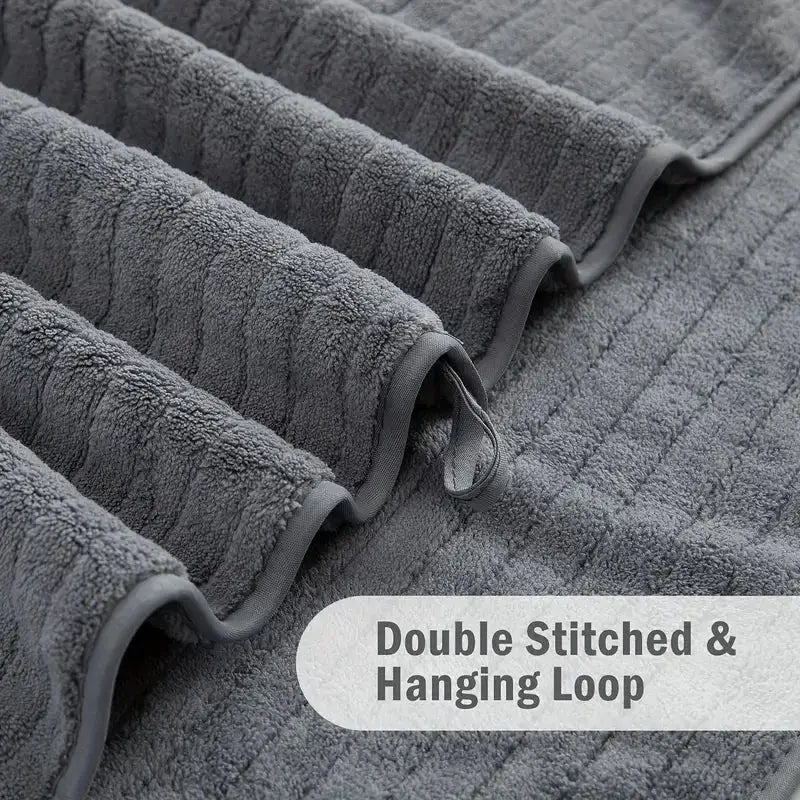 8-Piece gray bath towel set by Simples Market with 4 washcloths, 2 face towels, 2 bath towels and hanging loops