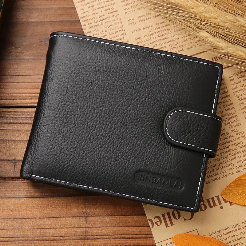 Men's black genuine leather wallet with snap strap closure, white stitching, textured cowhide by Simples Market