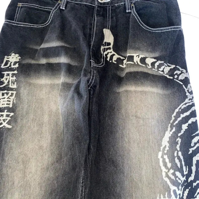 Men's dark denim jeans with oversized white graphic print and Chinese characters, baggy wide-leg high-waist style
