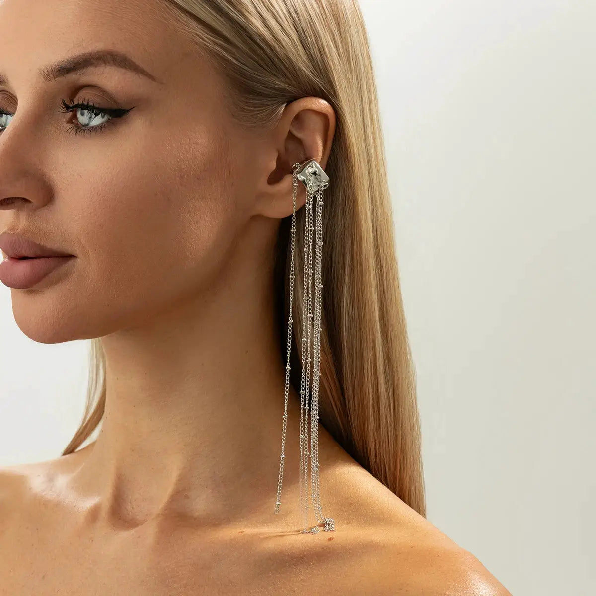 Elegant long tassel ear cuff clip earrings by Simples Market, silver-tone with crystal accents