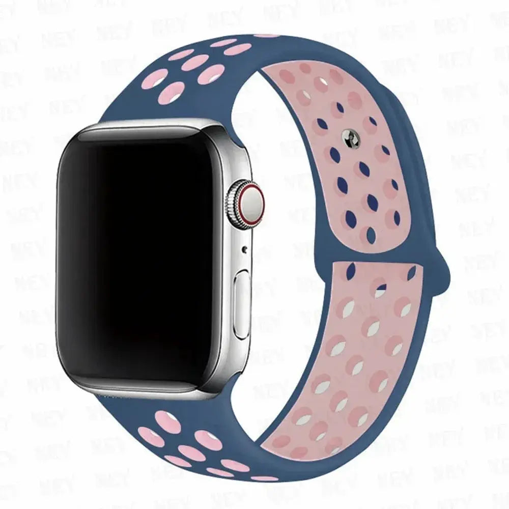 Simples Market silicone sport strap for Apple Watch, blue exterior with pink perforated inner, fits 38–45mm.