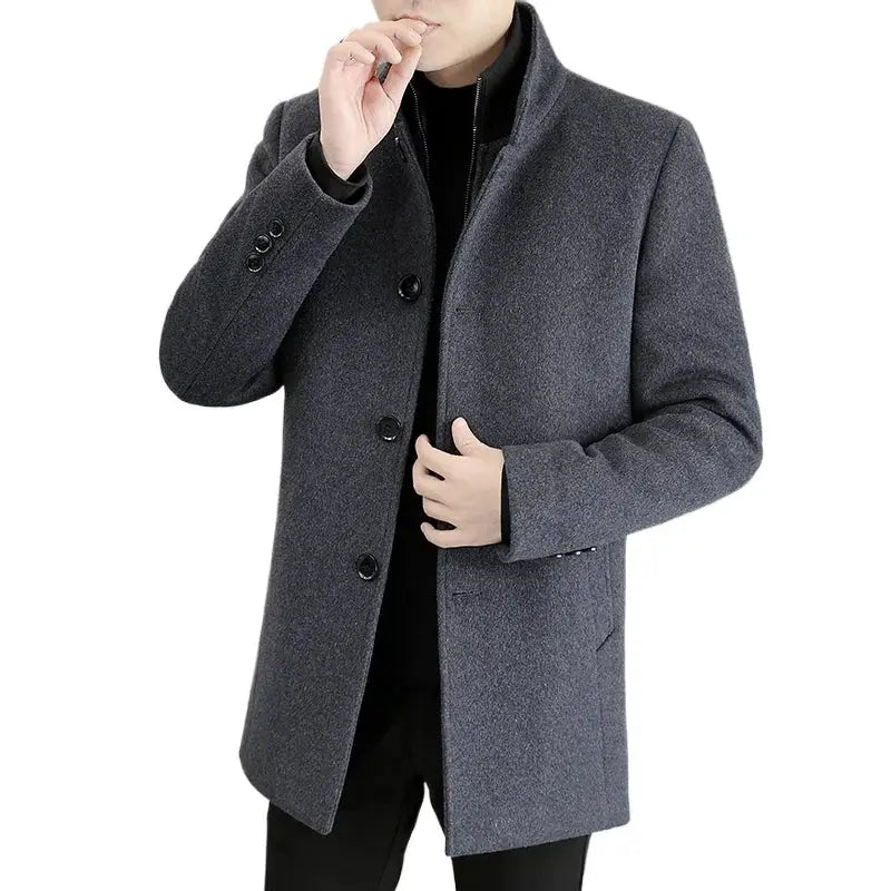 Men's long gray wool coat with stand collar and single-breasted button front, mid-thigh length