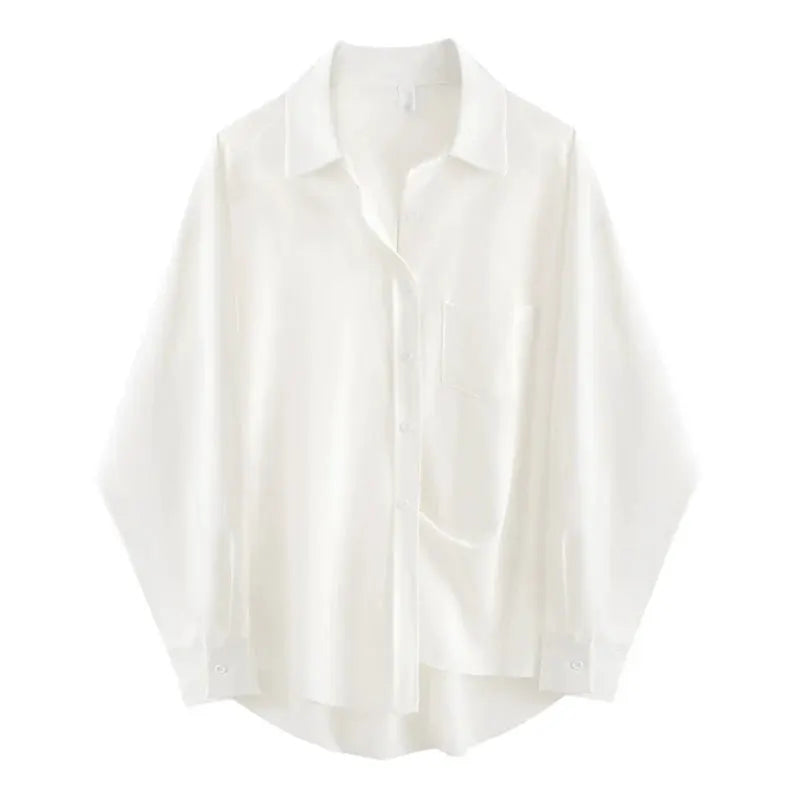 Oversized white long-sleeve button-up shirt with chest pocket