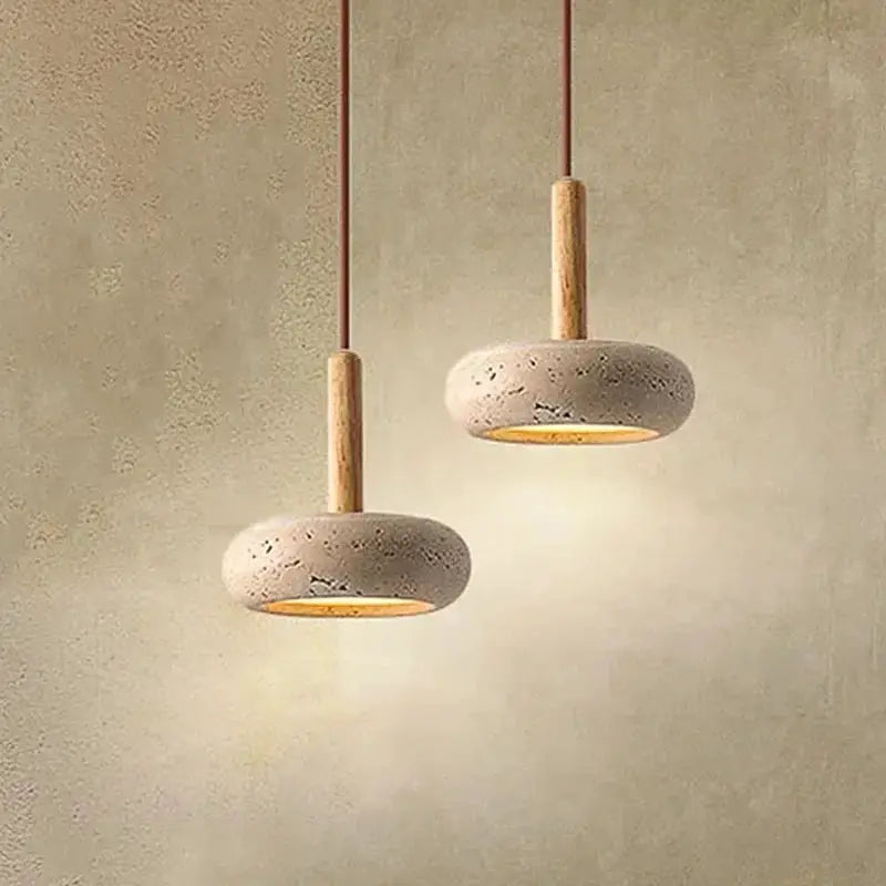 Simples Market two circular yellow stone LED pendant lamps with wooden stems and warm glow.