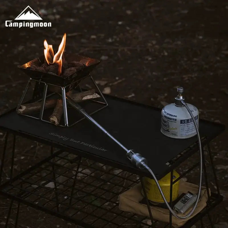 Campingmoon XD-6-NE torch spray gun, stainless steel, connected to propane canister on outdoor camping table