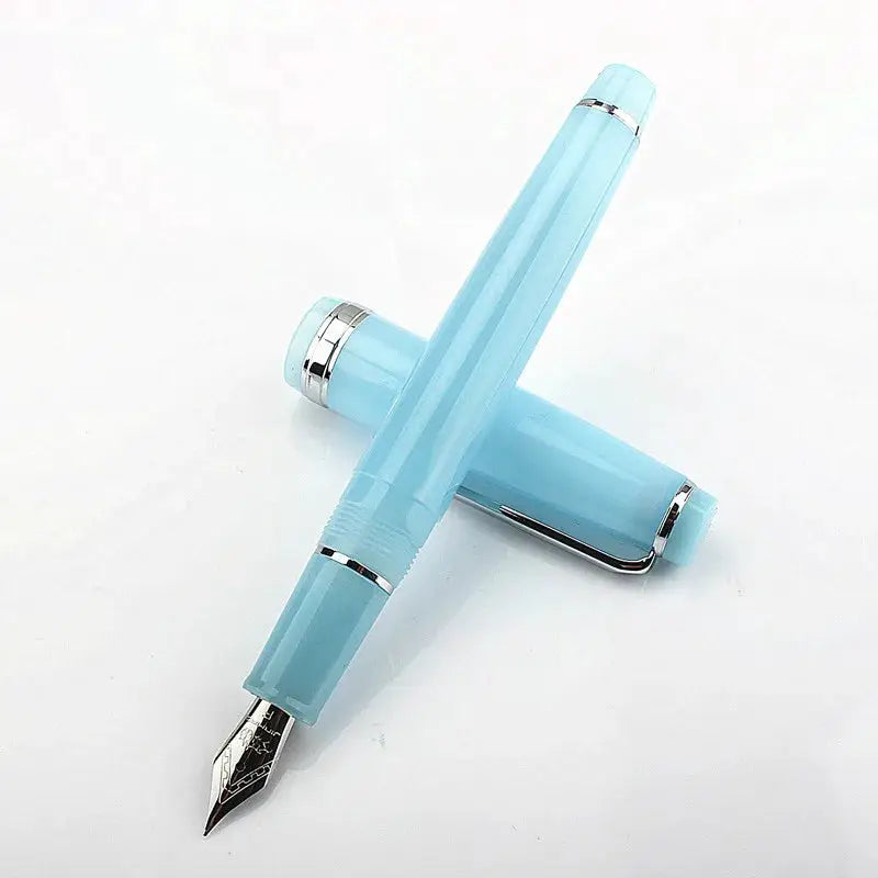 Jinhao 82 fountain pen in light blue acrylic with silver trim and converter