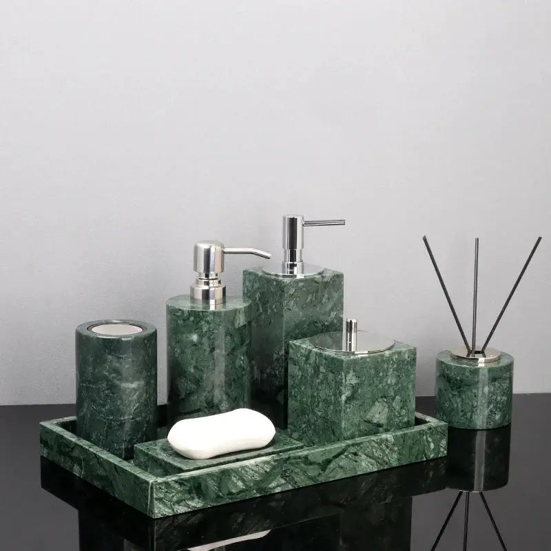 Green Indian marble bathroom accessories set with soap dispenser, soap dish, toothbrush holder, tissue box on a matching tray