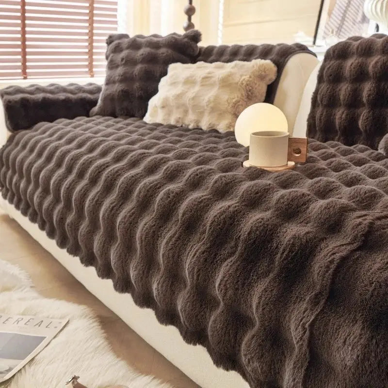 Thick faux rabbit fur sofa slipcover with three plush cushions in brown and beige