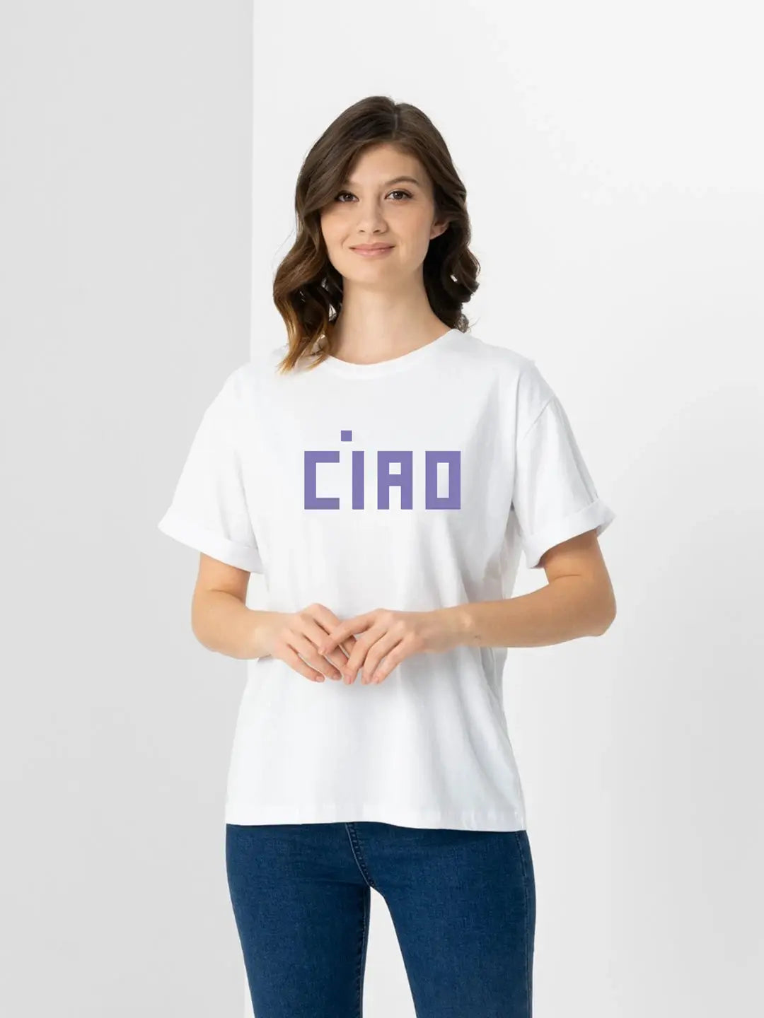 T-shirt white with purple CIAO logo worn by a model in blue jeans.