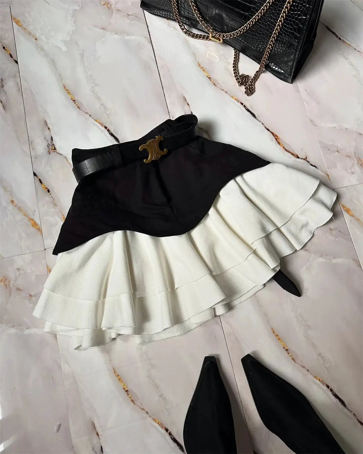 Chic Ruffles women's midi skirt with black waistband and white tiered pleated ruffles