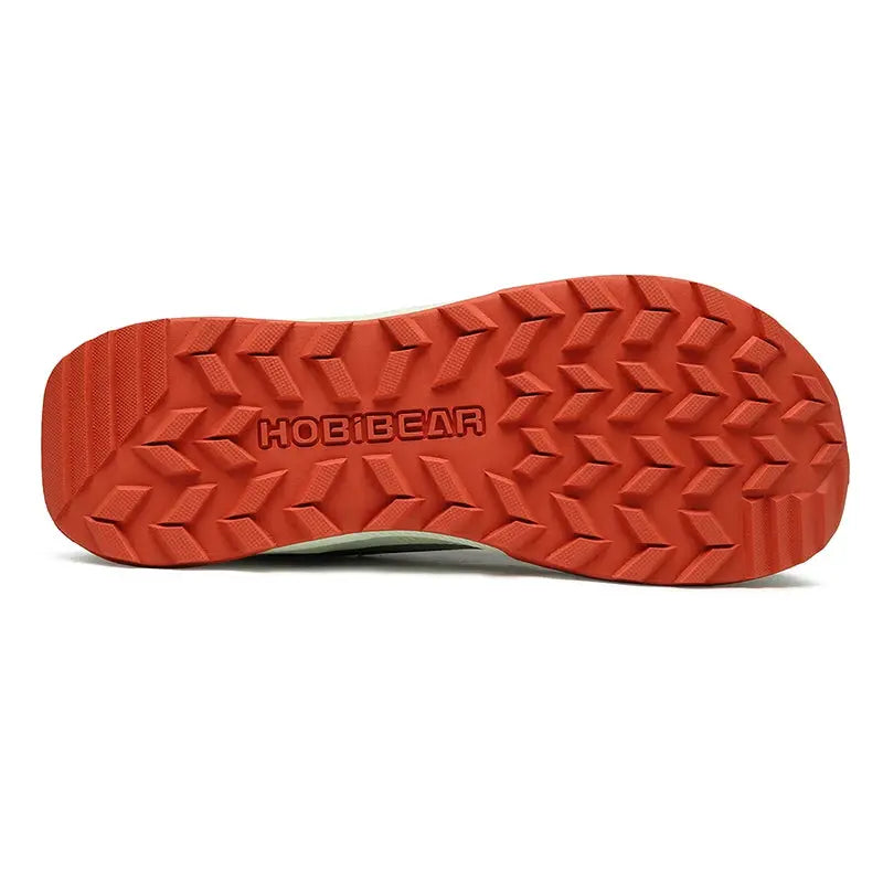 HOBIBEAR unisex running shoe outsole in orange with rugged tread pattern