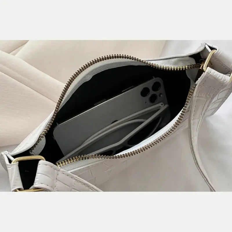 Underarm handbag by Simples Market in beige alligator-pattern PU leather with gold-tone hardware