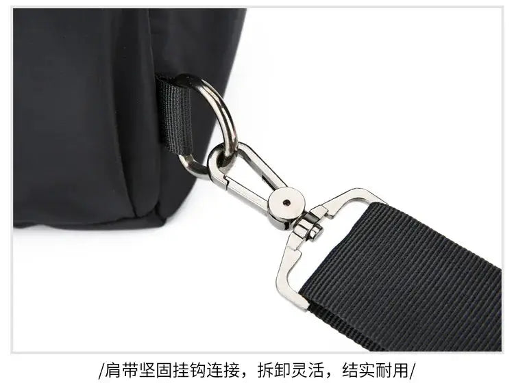 Men's chest bag from Simples Market in black canvas with detachable metal clip and adjustable nylon strap