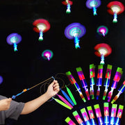 Outdoor LED Slingshot Rocket Helicopter Flying Toy With Glowing Lights For Kids Party Gift