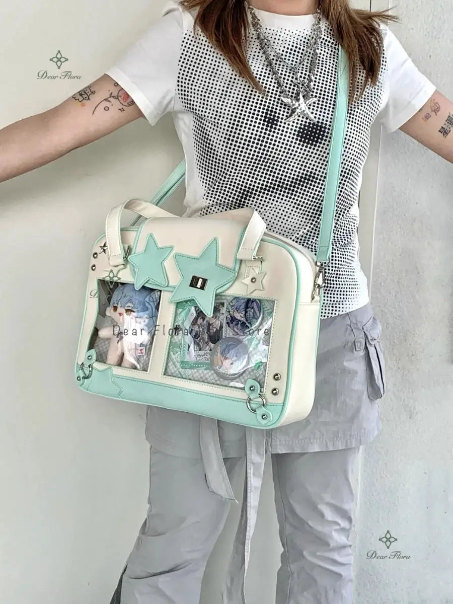 Y2K Star Ita Bag by Simples Market; mint and white crossbody bag with transparent pockets and star appliqués
