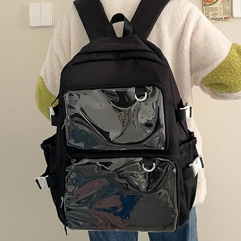 Japanese-style transparent ita backpack with two clear front pockets, black fabric, large capacity.