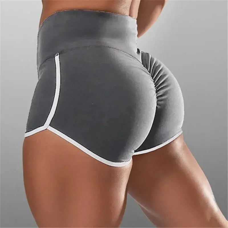 Women's gray high-waisted gym shorts with white piping, stretchy athletic shorts