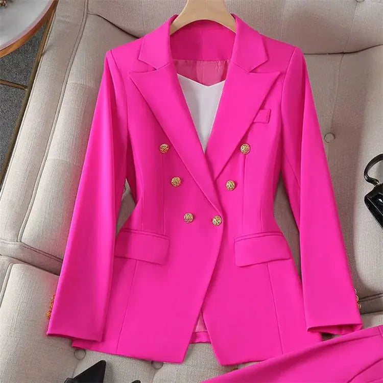 Bright pink women's double-breasted blazer set with gold buttons and matching pants