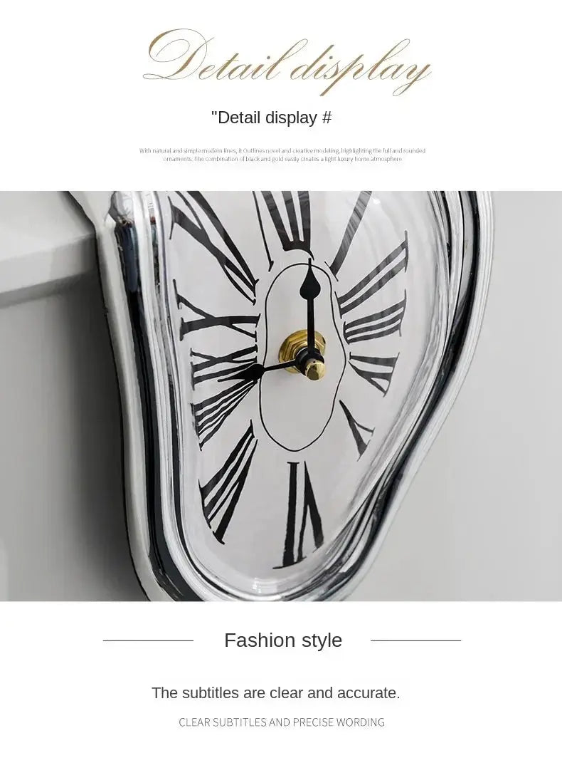 Surreal melting wall clock with white dial, black Roman numerals, gold center hardware, and a distorted silver frame.