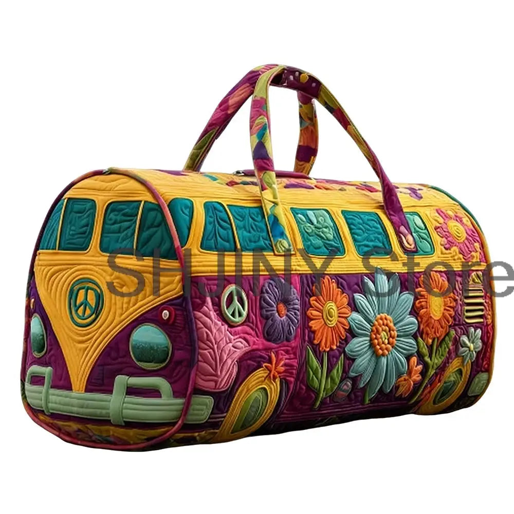 Quilted duffle bag by Simples Market in bright yellow and purple with camper-van floral design