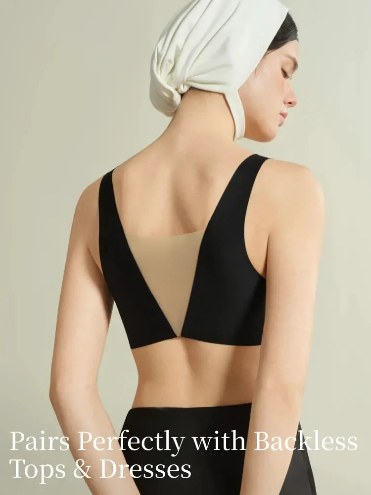 SUJIIN seamless plunge push-up bra by Simples Market; black with beige mesh back panel on a model