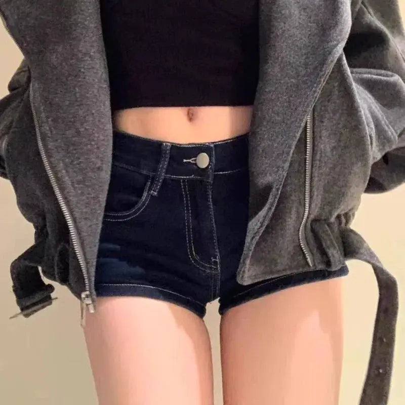 Casual denim shorts for women in dark indigo with white stitching, slim high-waisted cut and front button