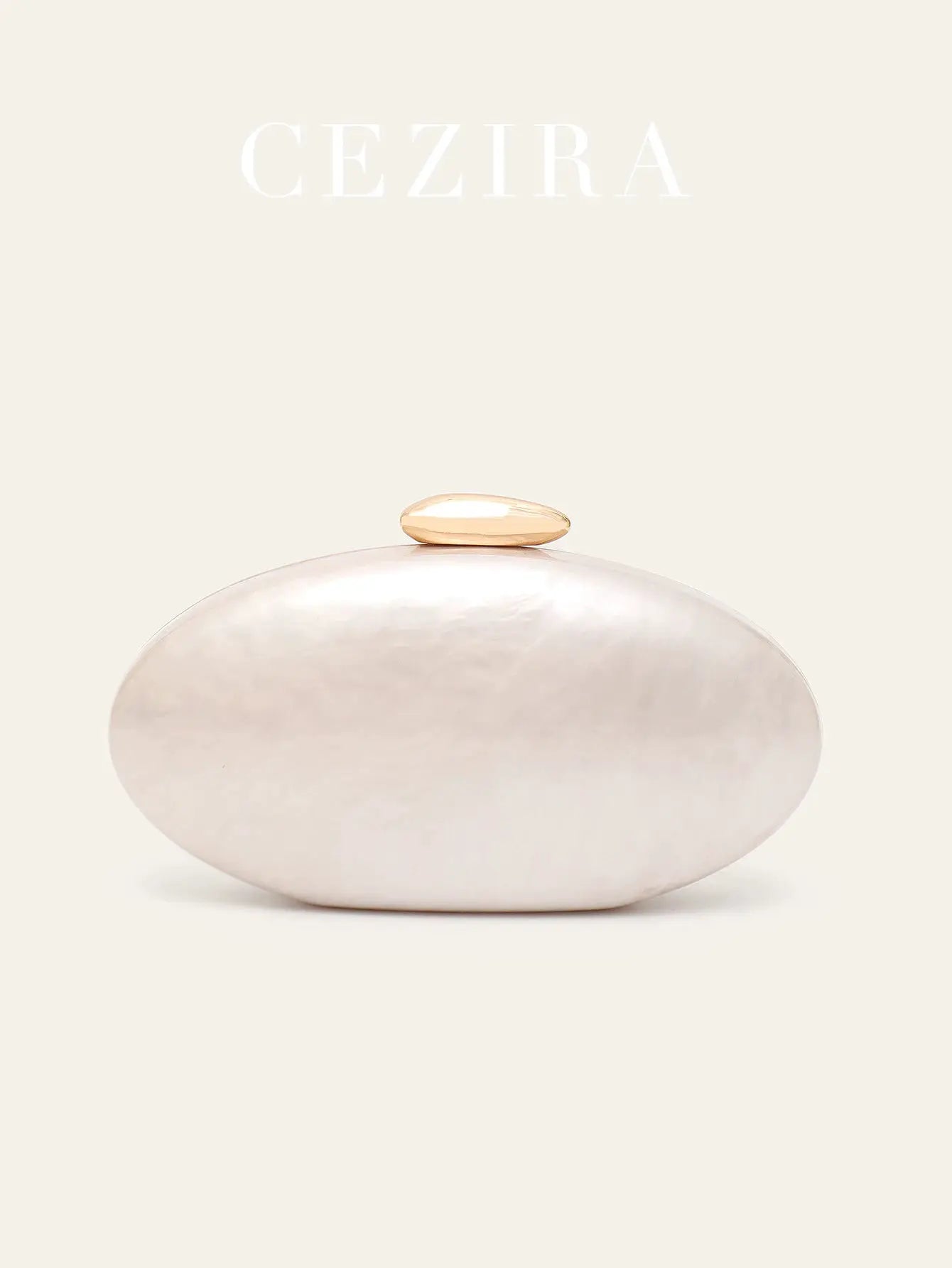 Oval white acrylic evening clutch by CEZIRA with rose-gold top clasp