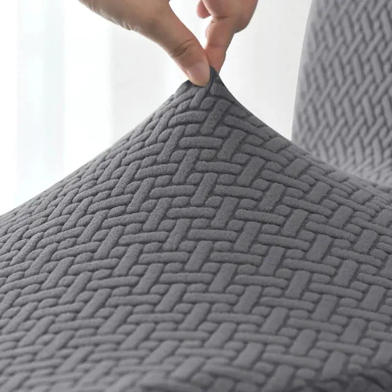 Jacquard stretch recliner sofa cover in grey with a woven pattern by Simples Market