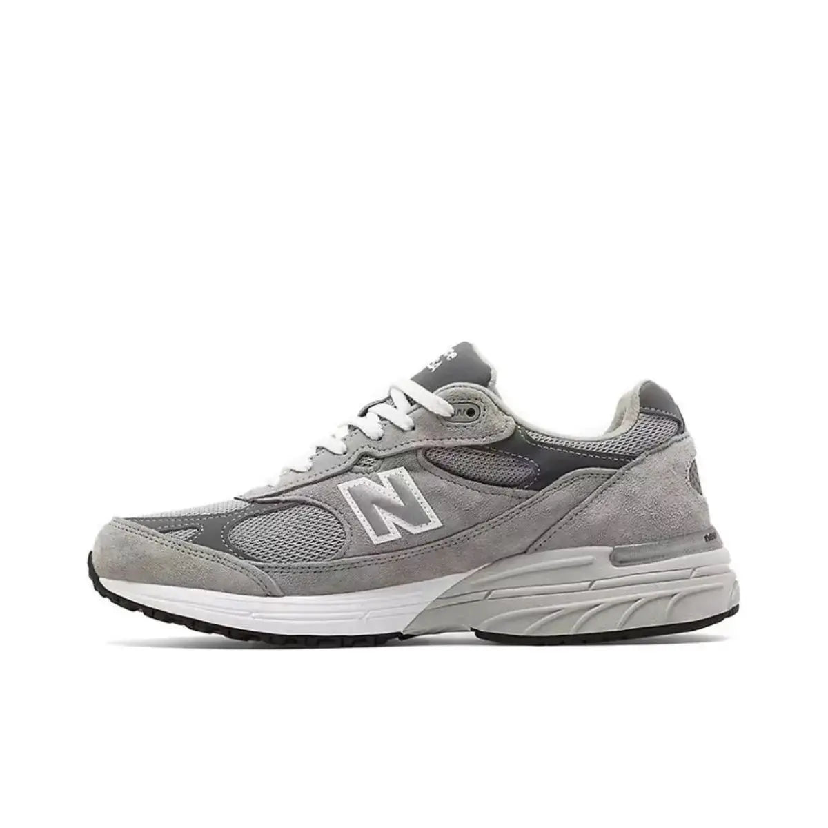 Grey mesh running shoes with white midsole, N logo, suede overlays, and padded collar for retro casual comfort