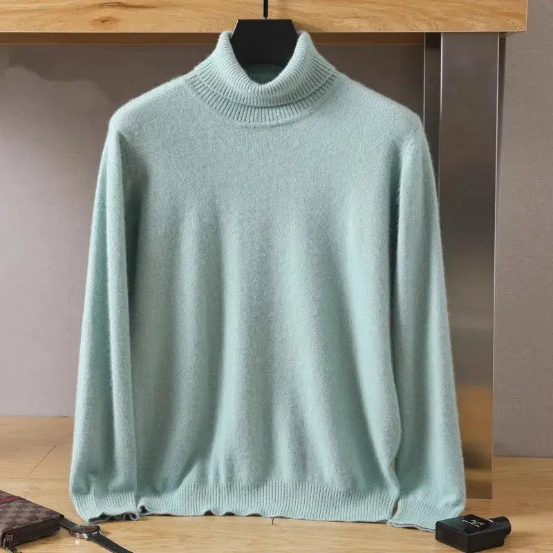 Men's knit sweater in light blue with ribbed high neck and long sleeves.