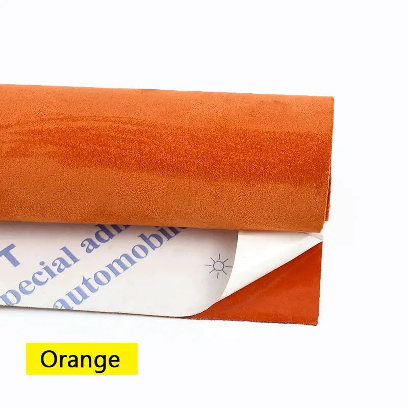 Self-adhesive orange suede fabric roll by Simples Market for car interior trims