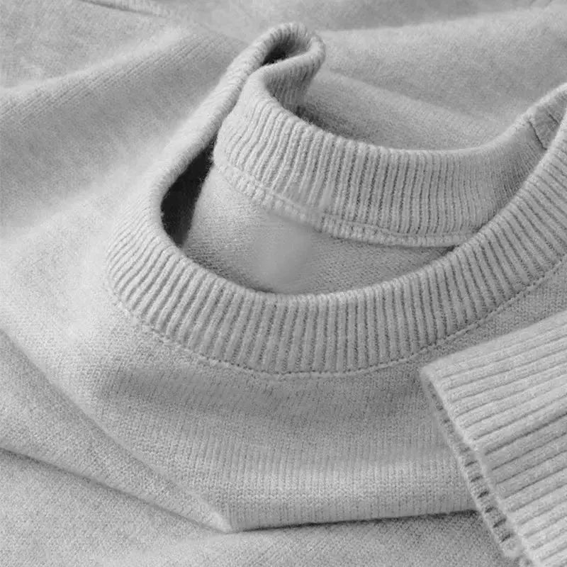 Men's crewneck knit pullover sweater in light gray with soft, lightweight fabric