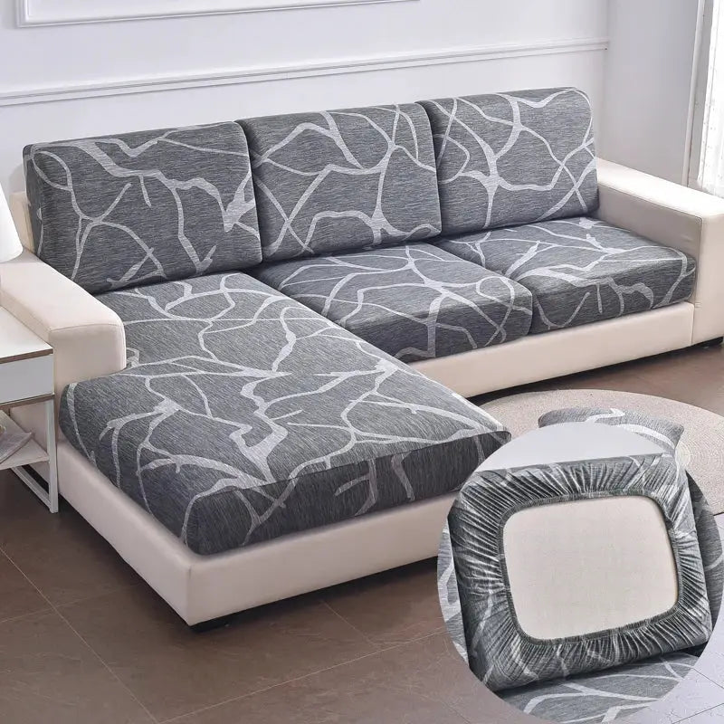 Stretch couch cushion slipcovers for 4 gray cushions with white abstract pattern; anti-slip furniture protector.