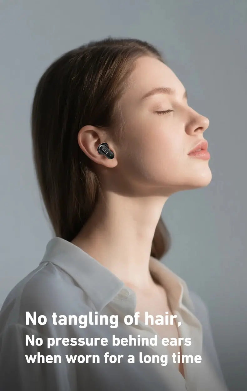 HTC NE51 Bluetooth TWS mini earbuds in black with green accents worn by a woman