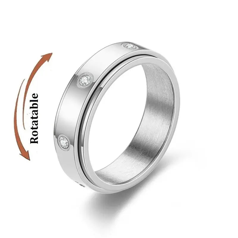 Fidget spinner ring; rotatable stainless steel knuckle ring with crystal accents