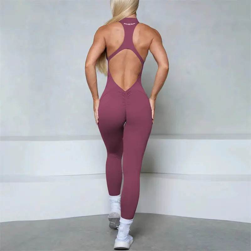 Simples Market women's zipper-scrunch back jumpsuit with open-back design in mauve purple for gym and yoga wear