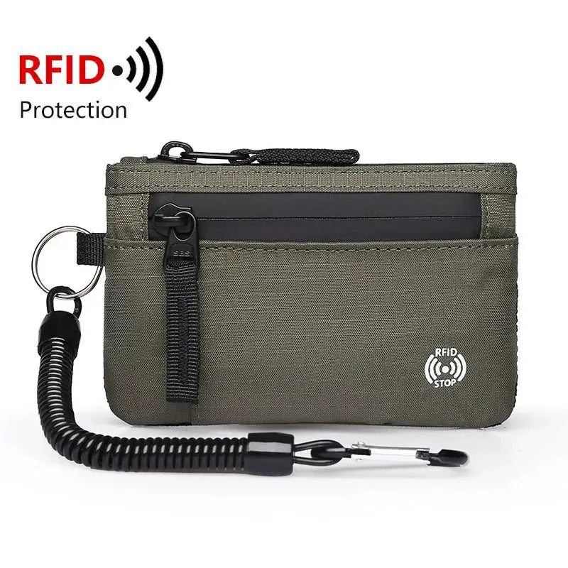 Zipper RFID wallet in olive nylon with front pocket and attached coiled lanyard