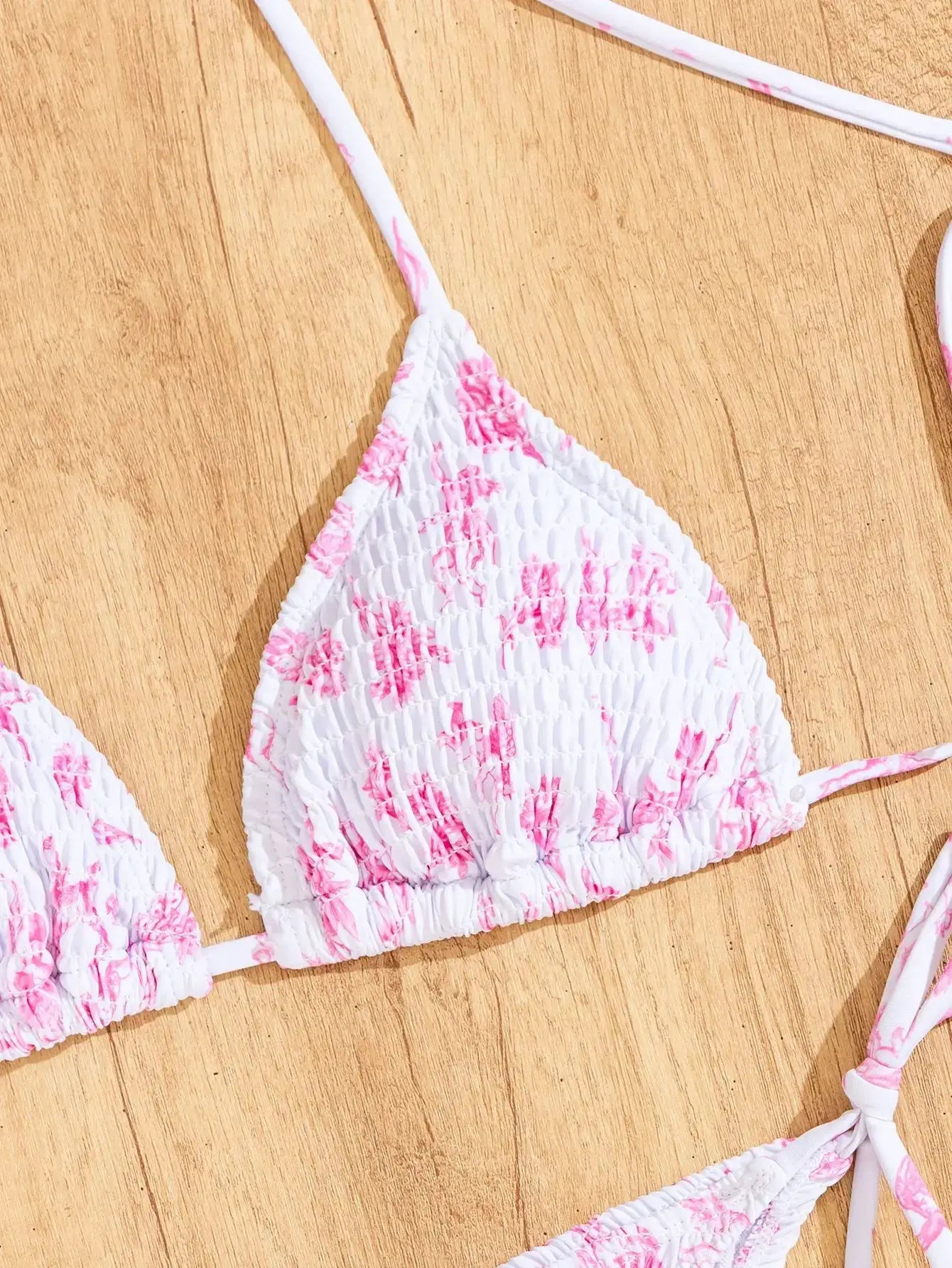 Triangle bikini set by Simples Market in white with pink floral print; push-up top and Brazilian bottoms (2 pieces)