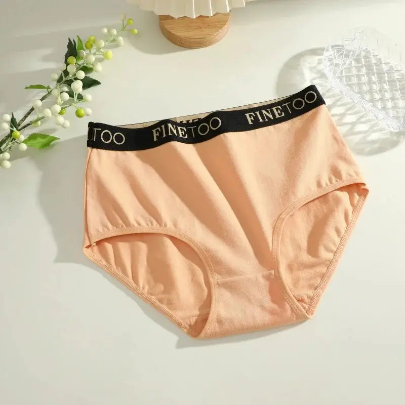 Finetoo peach cotton briefs with black branded waistband, low-rise seamless underwear