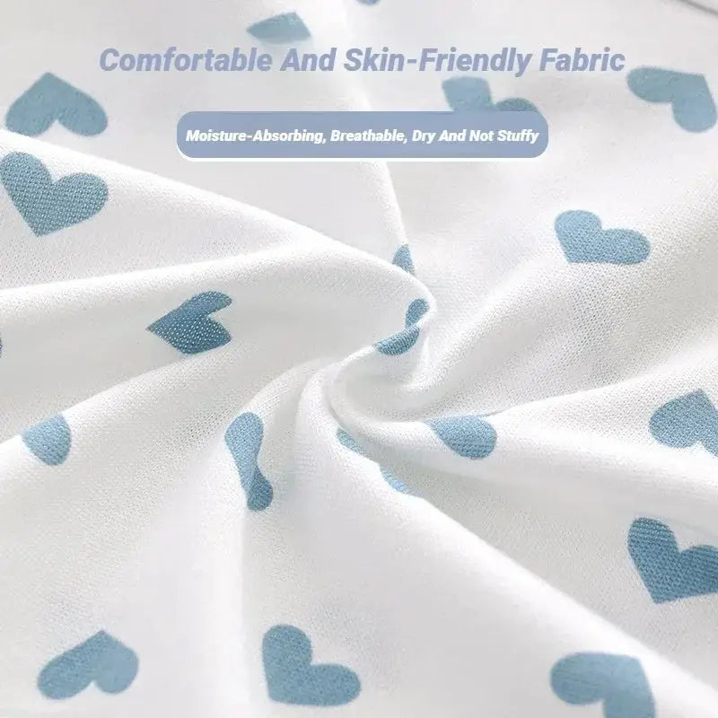 Women’s soft briefs with blue heart print on white fabric; breathable, skin-friendly underwear