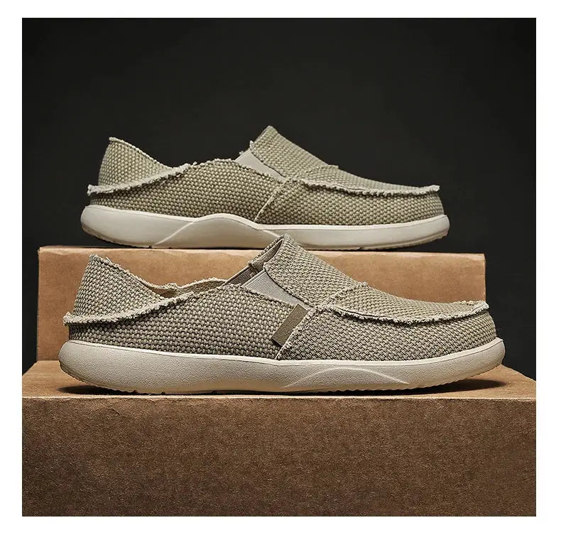Men's beige canvas slip-on loafers with frayed edges, lightweight casual shoes
