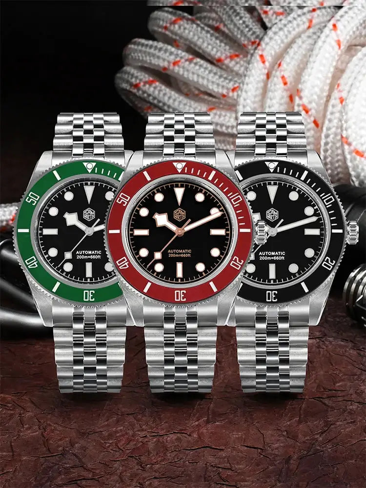 San Martin BB Diver watches, trio of 40mm automatic dive watches with green, red, and black bezels on steel bracelets.